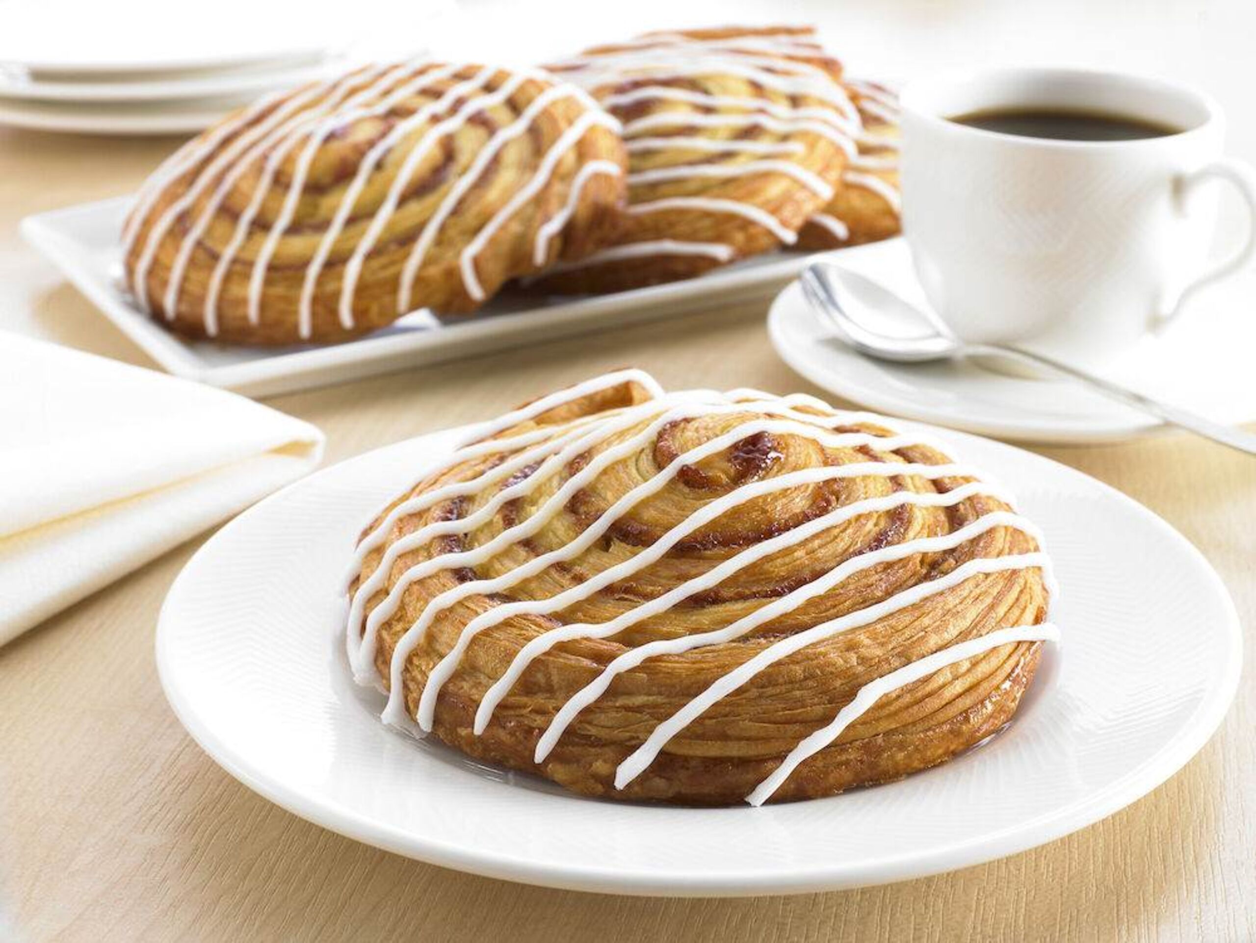 5748 Schulstad Large Cinnamon Swirl Danish Pastries with Coffee